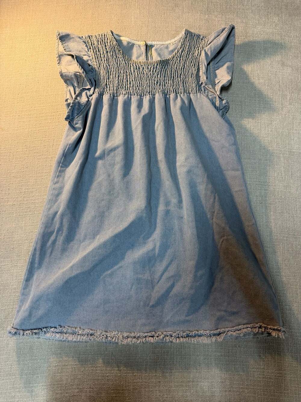 Girls Blue Denim Smocked Ruffle Sleeve Dress with Frayed Hem